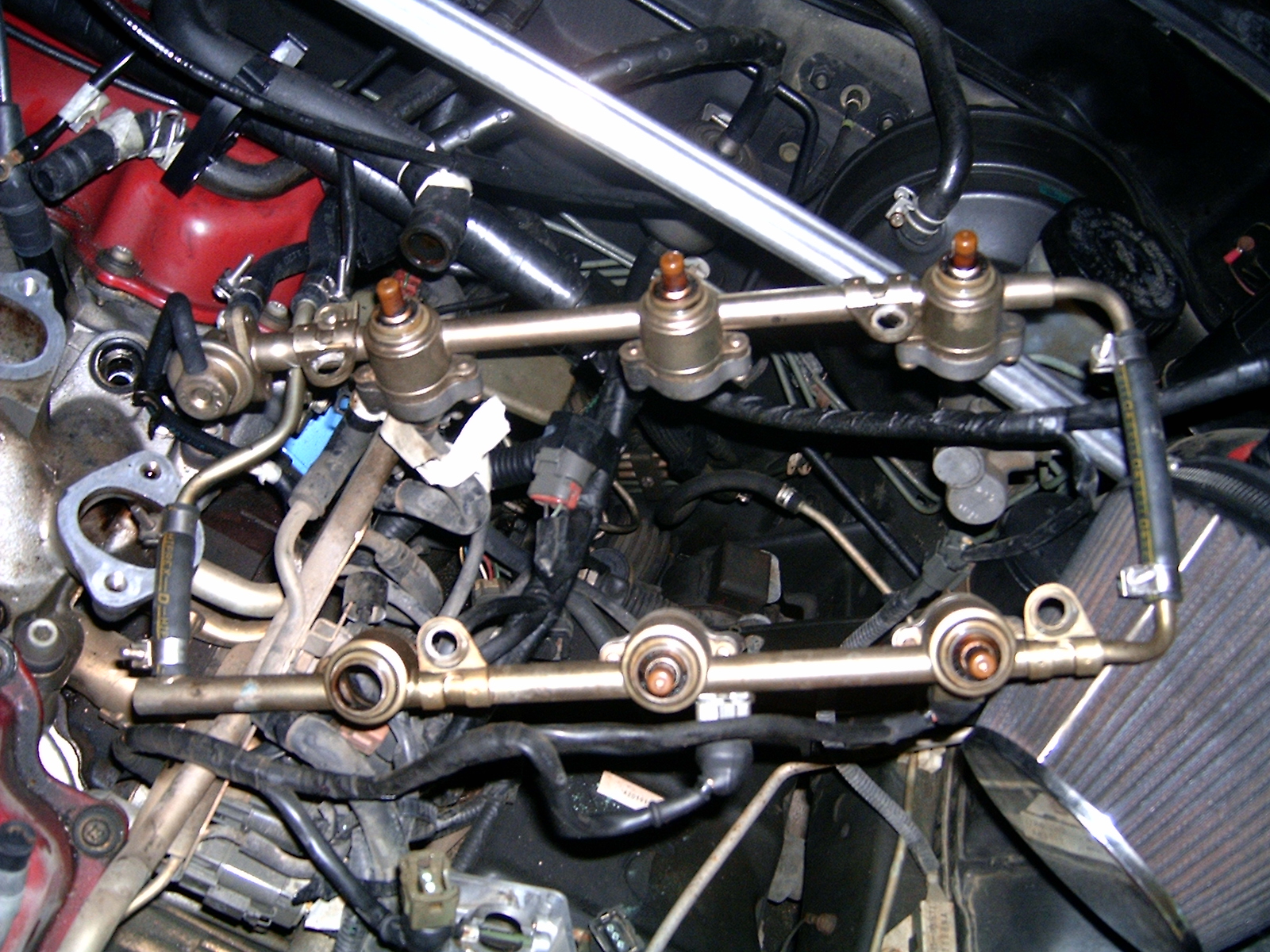 How to replace a fuel injector in a nissan maxima #8